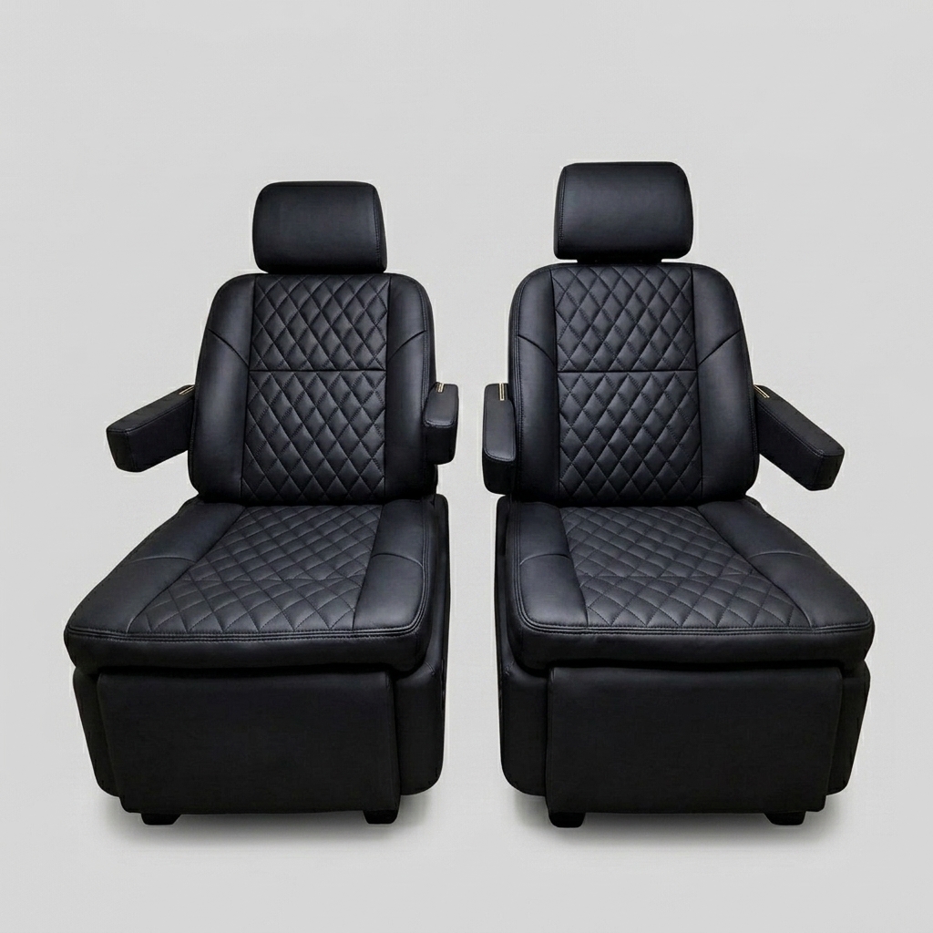 Premium black quilted leather captain's chairs reclined with footrests extended, showing electric reclining and footrest adjustment
