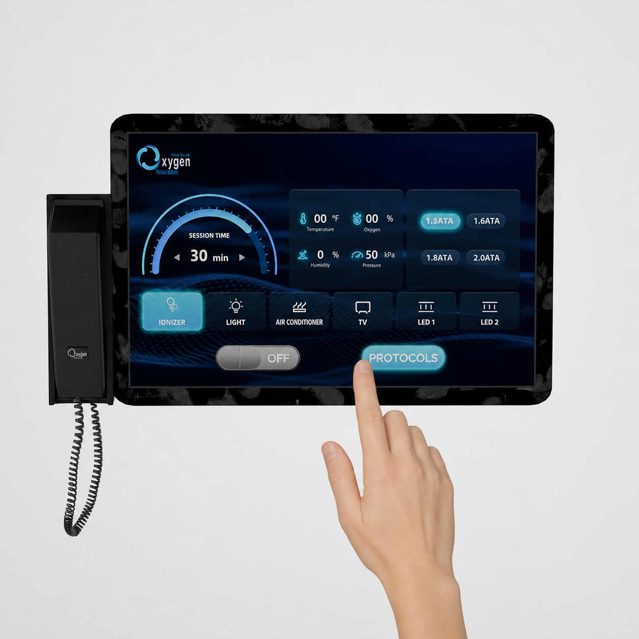 ExS64 wall-mounted control panel touchscreen with handset — showing 30 minute session time, temperature, oxygen, humidity and pressure readouts, 1.3–2.0 ATA pressure selection, ionizer, light, air conditioner, TV and LED controls, and a Protocols button being pressed